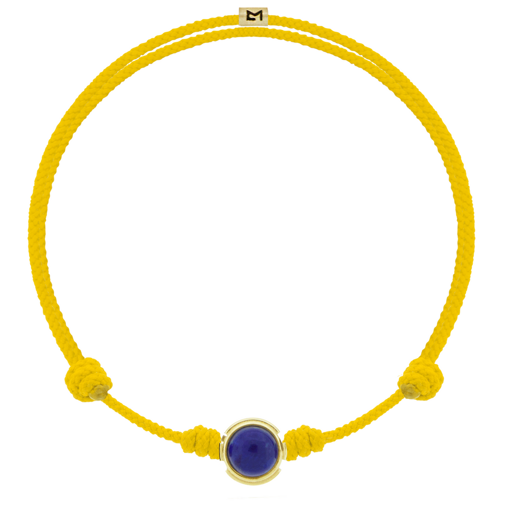 PAX Cabochon Bead on Yellow Cord Bracelet