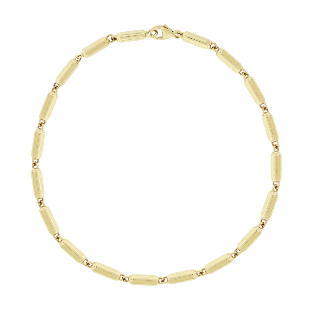 14k Yellow gold pill link bracelet.