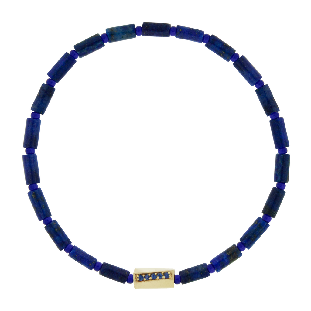 LUIS MORAIS 14k yellow gold twisted hexagon with three channels of blue sapphires on a gemstone and glass beaded bracelet.