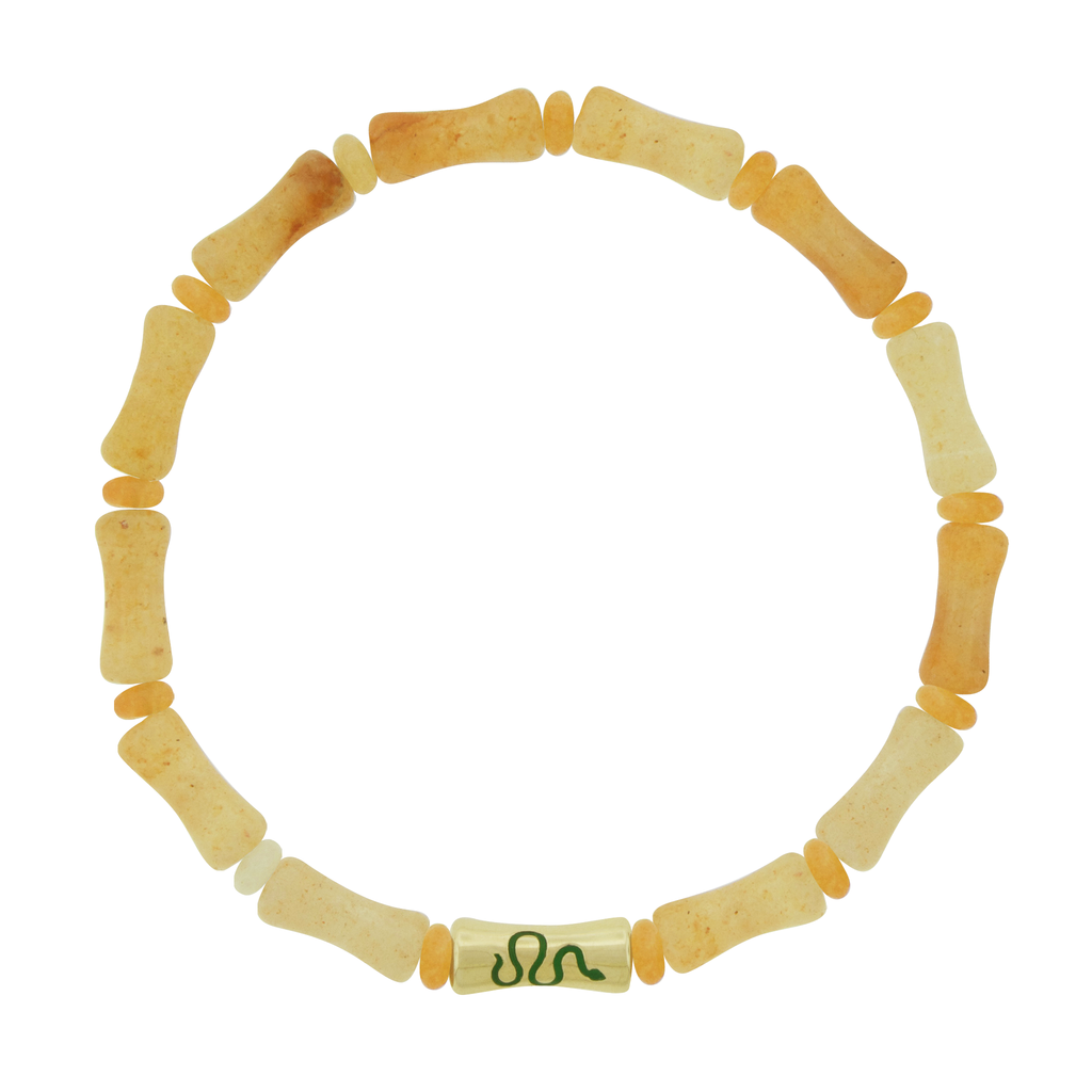 LUIS MORAIS 14k yellow gold single Sheath Bamboo tube with an enameled symbol on a gemstone beaded bracelet. The snake symbolizes transformation, wisdom, and enlightenment. A timeless emblem of growth and renewal, it represents the journey toward deeper knowledge and personal evolution.