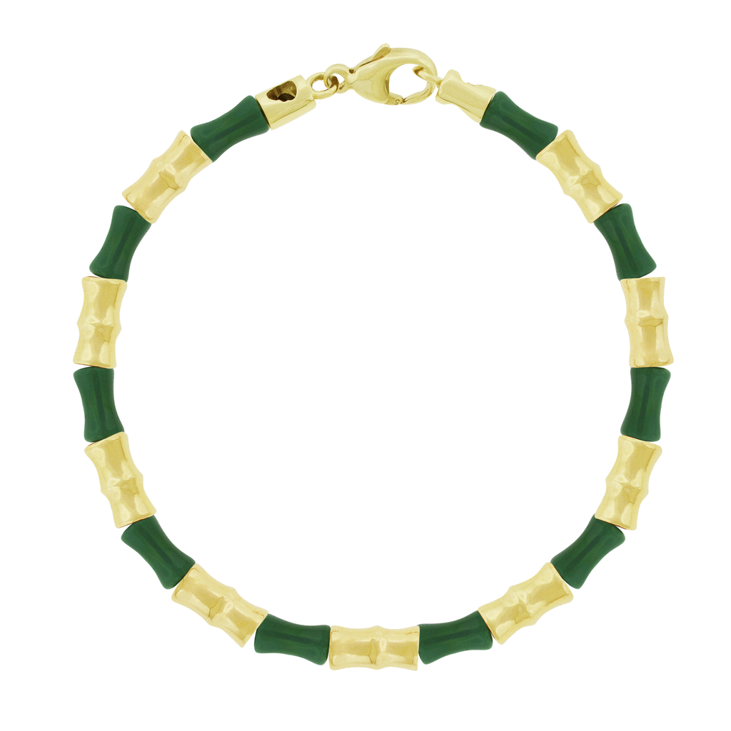 This LUIS MORAIS bracelet features 14k yellow gold Bamboo tubes alternating with glass beads. Lobster clasp closure. Bamboo symbolizes strength, resilience, and the ability to grow through adversity.