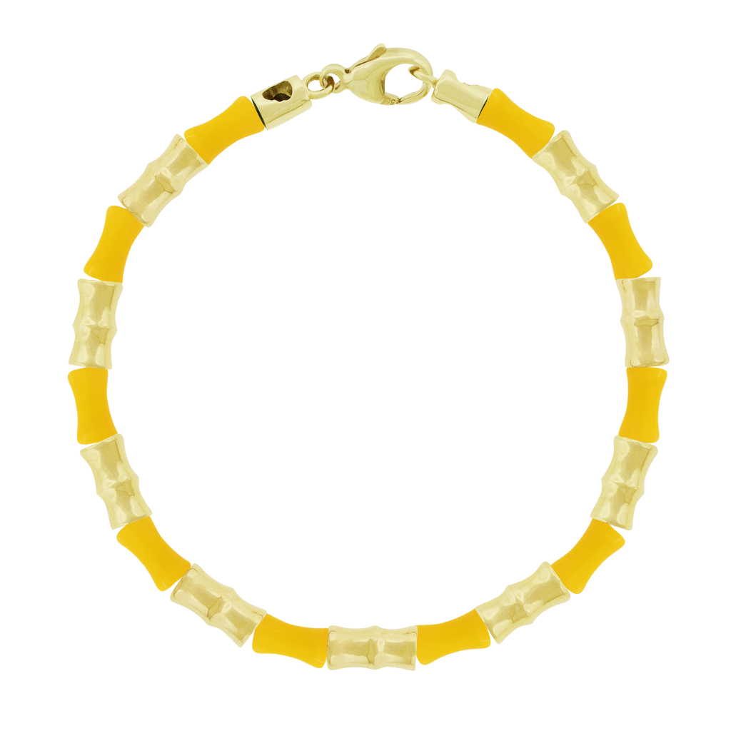 This LUIS MORAIS bracelet features 14k yellow gold Bamboo tubes alternating with glass beads. Lobster clasp closure. Bamboo symbolizes strength, resilience, and the ability to grow through adversity.