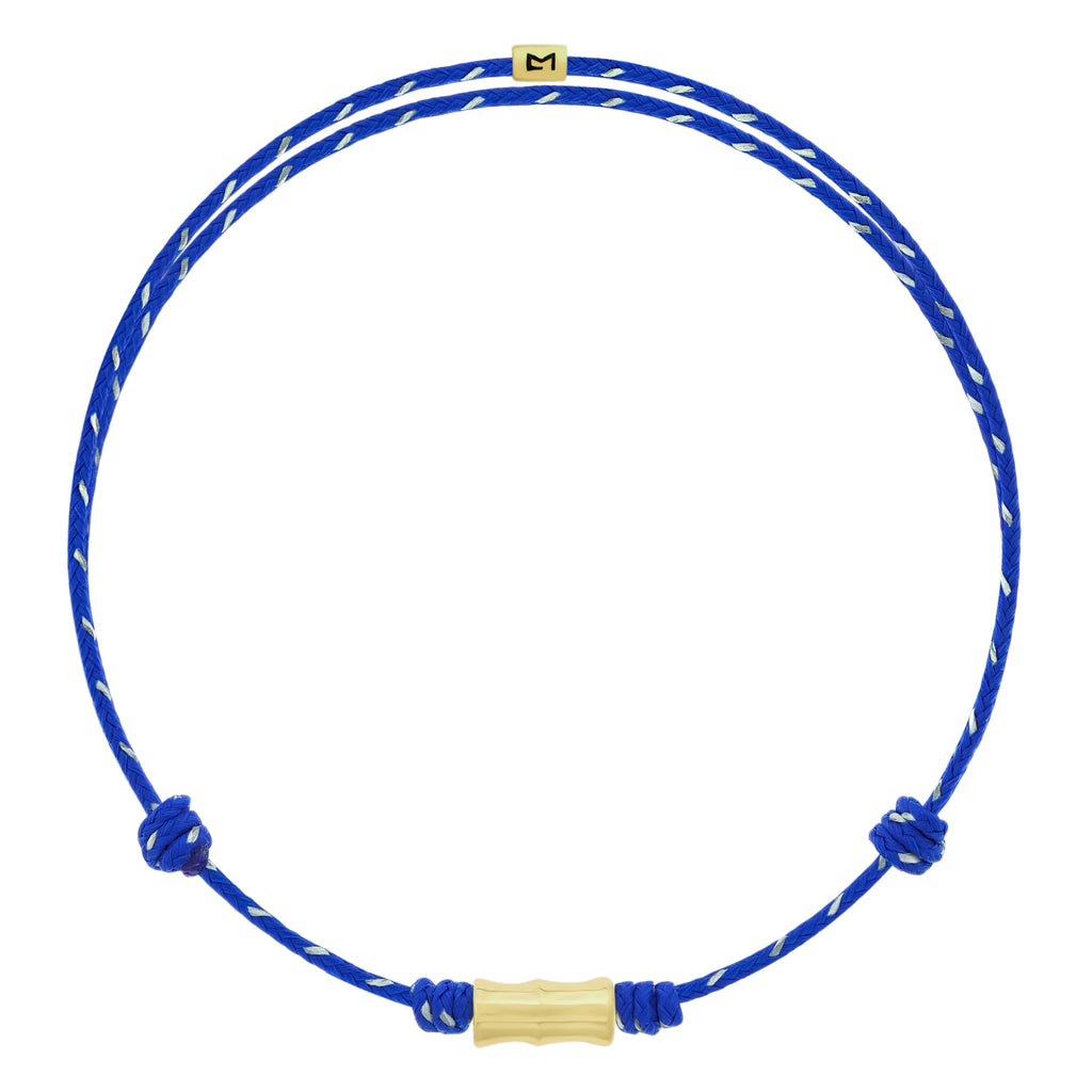 LUIS MORAIS 14k yellow gold Bamboo tube on an adjustable cord bracelet. Gold logo spacer.
