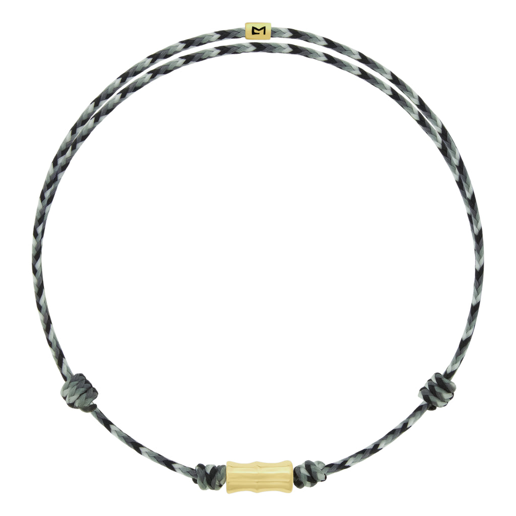 LUIS MORAIS 14k yellow gold Bamboo tube on an adjustable cord bracelet. Gold logo spacer.