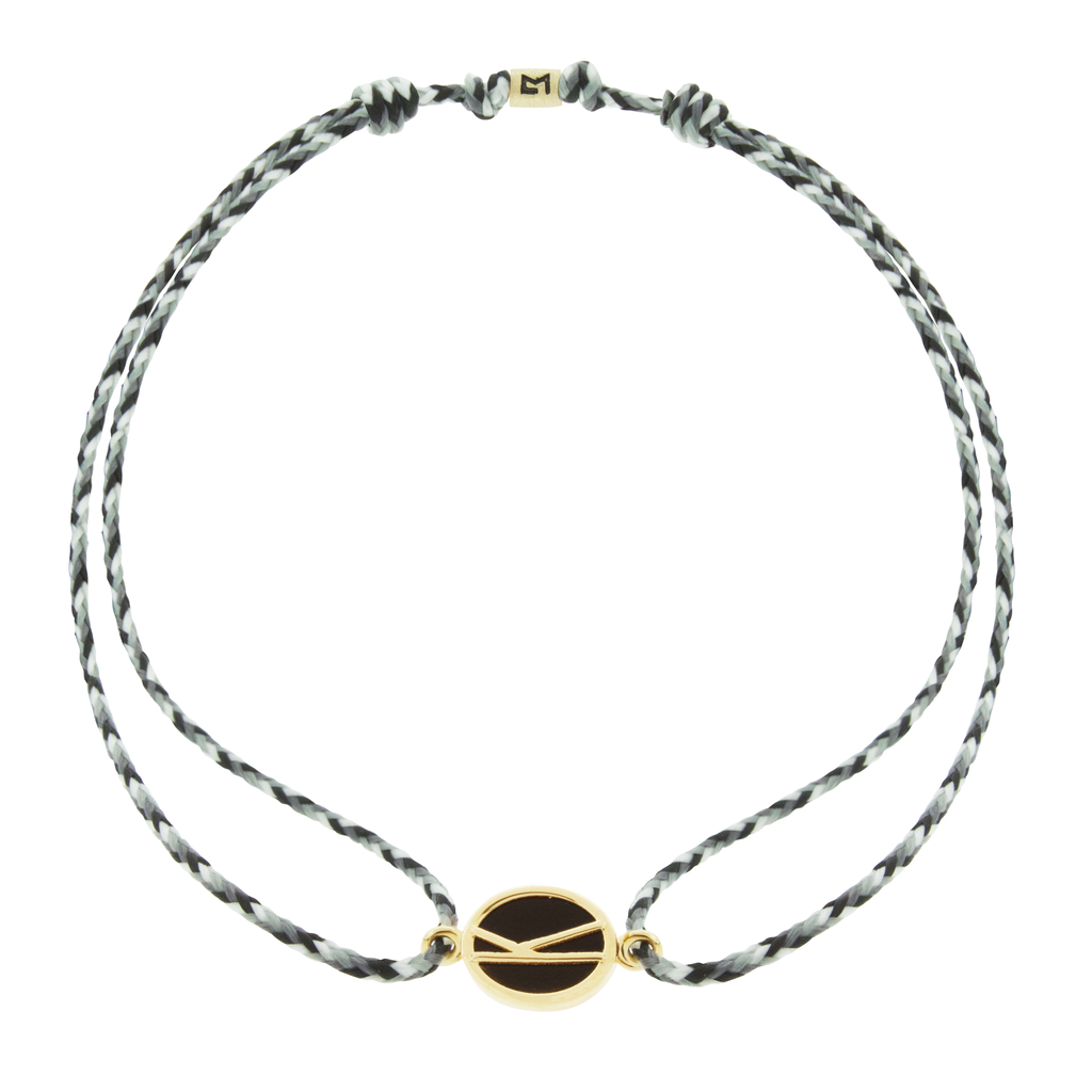 LUIS MORAIS 14k yellow gold large framed initial oval with a gemstone backing on a cord bracelet. Make this bracelet uniquely yours by choosing your initial and cord color below!