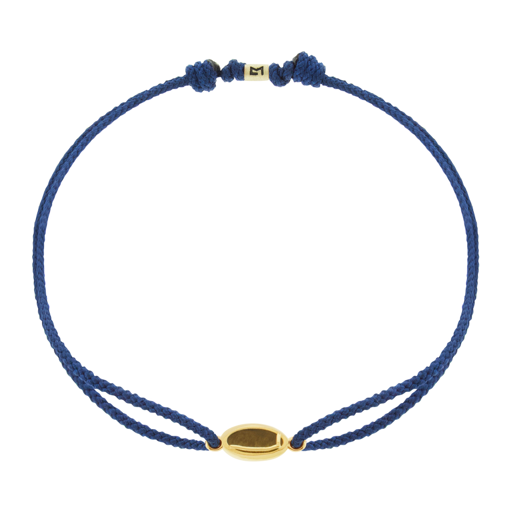 LUIS MORAIS 14k yellow gold framed initial oval with a gemstone backing on a cord bracelet. Make this bracelet uniquely yours by choosing your initial and cord color below!