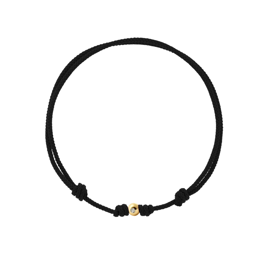 LUIS MORAIS small yellow gold ball with diamond on a black cord bracelet