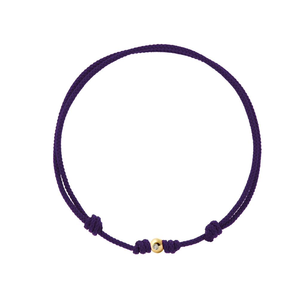 LUIS MORAIS small yellow gold ball with diamond on a purple cord bracelet